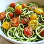Raw Spiralized Zucchini Noodles with Tomatoes and Pesto